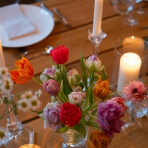 Event table with floral centrepiece and candles